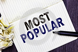 Conceptual hand writing showing Most Popular. Business photo text Liked Followed Enjoyed by majority of the people in a society Ma