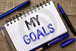 Conceptual hand writing showing My Goals. Business photo showcasing Goal Aim Strategy Determination Career Plan Objective Target V