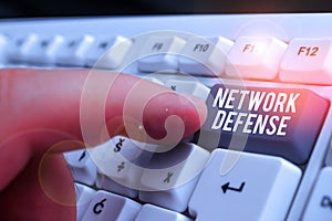 Conceptual hand writing showing Network Defense. Business photo showcasing easures to protect and defend information from
