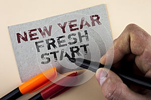 Conceptual hand writing showing New Year Fresh Start. Business photo text Time to follow resolutions reach out dream job written b