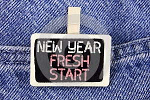 Conceptual hand writing showing New Year Fresh Start. Business photo text Time to follow resolutions reach out dream job written o