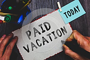 Conceptual hand writing showing Paid Vacation. Business photo text Sabbatical Weekend Off Holiday Time Off Benefits Man holding ma