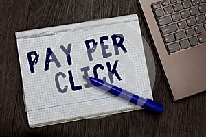 Conceptual hand writing showing Pay Per Click. Business photo text Internet Advertising Model Search Engine marketing Strategy Ope