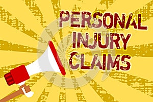 Conceptual hand writing showing Personal Injury Claims. Business photo text being hurt or injured inside work environment Man hold