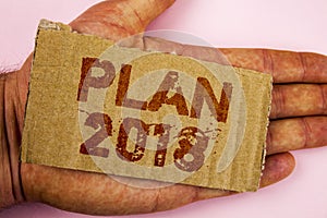 Conceptual hand writing showing Plan 2018. Business photo showcasing Challenging Ideas Goals for New Year Motivation to Start. Con