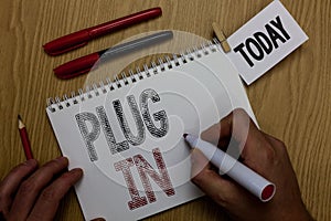 Conceptual hand writing showing Plug In. Business photo showcasing putting device into electricity to turn it on Power it Connecti