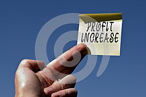 Conceptual hand writing showing Profit Increase. Business photo text the growth in the amount of revenue gained from a