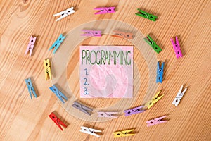 Conceptual hand writing showing Programming. Business photo text the process of preparing an instructional program for a