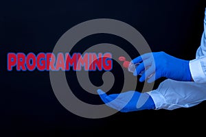 Conceptual hand writing showing Programming. Business photo text the process of preparing an instructional program for a photo