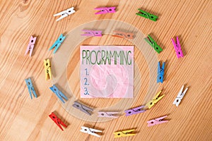 Conceptual hand writing showing Programming. Business photo text the process of preparing an instructional program for a photo