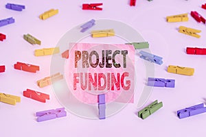 Conceptual hand writing showing Project Funding. Business photo text capital required to undertake a project or programme Colored