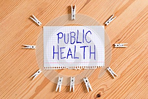 Conceptual hand writing showing Public Health. Business photo showcasing government protection and improvement of community health