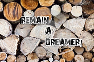 Conceptual hand writing showing Remain A Dreamer. Business photo text they spend lot of time thinking about and planning