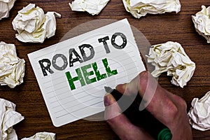 Conceptual hand writing showing Road To Hell. Business photo showcasing Extremely dangerous passageway Dark Risky Unsafe travel Ma