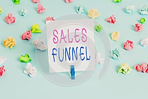 Conceptual hand writing showing Sales Funnel. Business photo showcasing process through which a company ells its