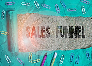 Conceptual hand writing showing Sales Funnel. Business photo text process through which a company ells its products to buyers