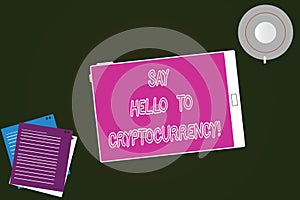 Conceptual hand writing showing Say Hello To Cryptocurrency. Business photo text Introducing decentralized money exchange Tablet