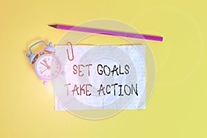 Conceptual hand writing showing Set Goals Take Action. Business photo showcasing Act on a specific and clearly laid out