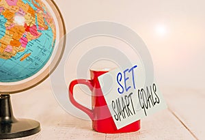 Conceptual hand writing showing Set Smart Goals. Business photo showcasing giving criteria to guide in the setting of