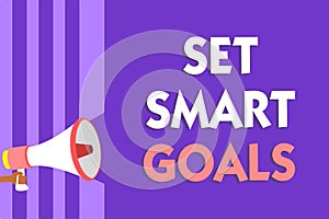 Conceptual hand writing showing Set Smart Goals. Business photo text Establish achievable objectives Make good business plans Mega