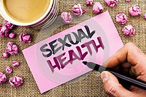 Conceptual hand writing showing Sexual Health. Business photo text STD prevention Use Protection Healthy Habits Sex Care written b