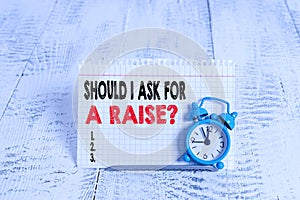 Conceptual hand writing showing Should I Ask For A Raise Question. Business photo text deanalysisding increase in your