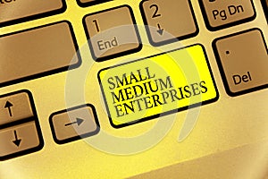 Conceptual hand writing showing Small Medium Enterprises. Business photo showcasing companies with less than thousand workers Keyb