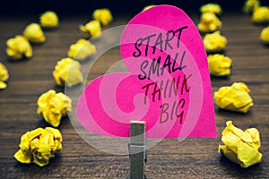 Conceptual hand writing showing Start Small Think Big. Business photo text Initiate with few things have something great in mind P