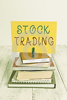 Conceptual hand writing showing Stock Trading. Business photo showcasing Buy and Sell of Securities Electronically on