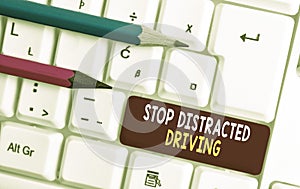 Conceptual hand writing showing Stop Distracted Driving. Business photo text asking to be careful behind wheel drive