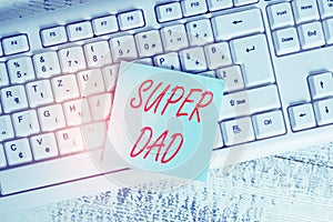 Conceptual hand writing showing Super Dad. Business photo showcasing Children idol and super hero an inspiration to look