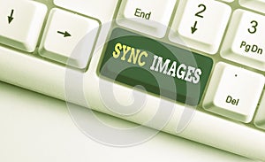 Conceptual hand writing showing Sync Images. Business photo showcasing Making photos identical in all devices Accessible