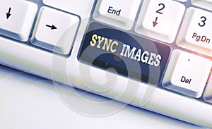 Conceptual hand writing showing Sync Images. Business photo showcasing Making photos identical in all devices Accessible anywhere