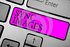 Conceptual hand writing showing Sync Images. Business photo text Making photos identical in all devices Accessible anywhere Keyboa