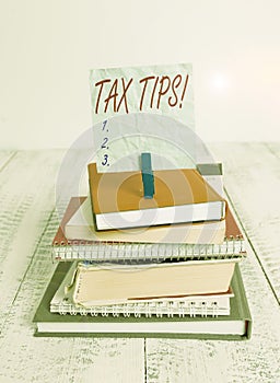 Conceptual hand writing showing Tax Tips. Business photo showcasing compulsory contribution to state revenue levied by government