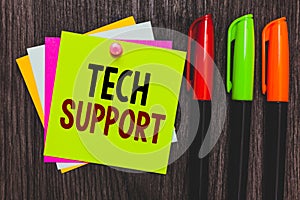 Conceptual hand writing showing Tech Support. Business photo showcasing Assisting individuals who are having technical problems Pa
