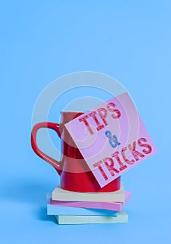 Conceptual hand writing showing Tips And Tricks. Business photo showcasing Steps Lifehacks Handy advice Recommendations photo