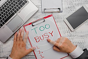 Conceptual hand writing showing Too Busy. Business photo showcasing No time to relax no idle time for have so much work photo