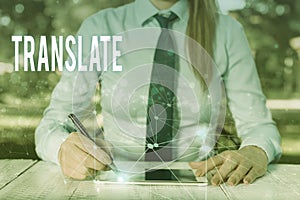 Conceptual hand writing showing Translate. Business photo showcasing Another word with same equivalent meaning of a photo