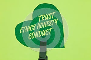 Conceptual hand writing showing Trust Ethics Honesty Conduct. Business photo showcasing connotes positive and virtuous attributes