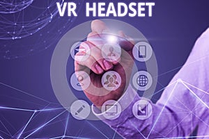 Conceptual hand writing showing Vr Headset. Business photo text headmounted device that provides virtual reality for the