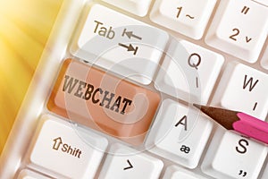 Conceptual hand writing showing Webchat. Business photo showcasing system that allows users to communicate in real time