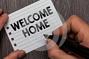 Conceptual hand writing showing Welcome Home. Business photo showcasing Expression Greetings New Owners Domicile Doormat Entry Man photo
