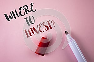 Conceptual hand writing showing Where To Invest Question. Business photo showcasing Right Place Stock Share to spend your savings