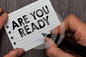 Conceptual hand writing showing Are You Ready. Business photo showcasing Alertness Preparedness Urgency Game Start Hurry Wide awak photo
