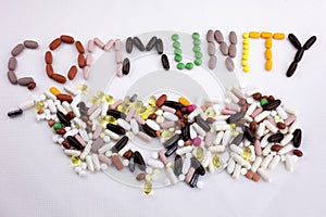 Conceptual Hand writing text caption inspiration Medical care Health concept written with pills drugs capsule word