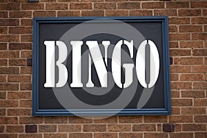 Conceptual hand writing text caption inspiration showing announcement Bingo. Business concept for Lettering Gambling to Win Price