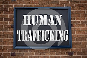 Conceptual hand writing text caption inspiration showing announcement Human Trafficking. Business concept for Slavery Crime Preven