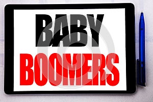 Conceptual hand writing text caption inspiration showing Baby Boomers. Business concept for Demographic Generation written on tabl