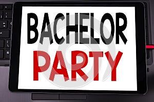 Conceptual hand writing text caption inspiration showing Bachelor Party. Business concept for Stag Fun Celebrate written on tablet photo